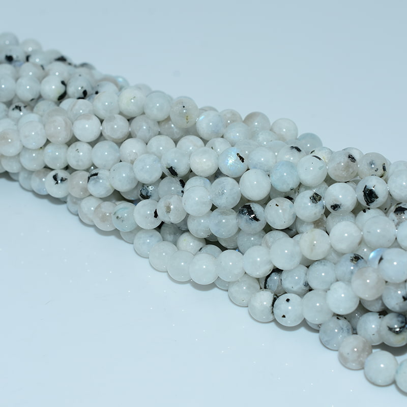 8mm White Labradorite Beads close-up showing smooth polish and natural blue shimmer