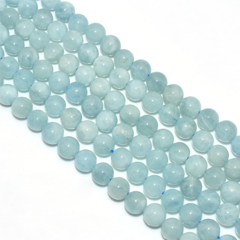 Top view of Aquamarine Beads highlighting translucent blue surface and shine