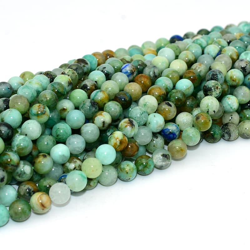 Azurite Chrysocolla Beads viewed from different angle showing color variations and smooth polish