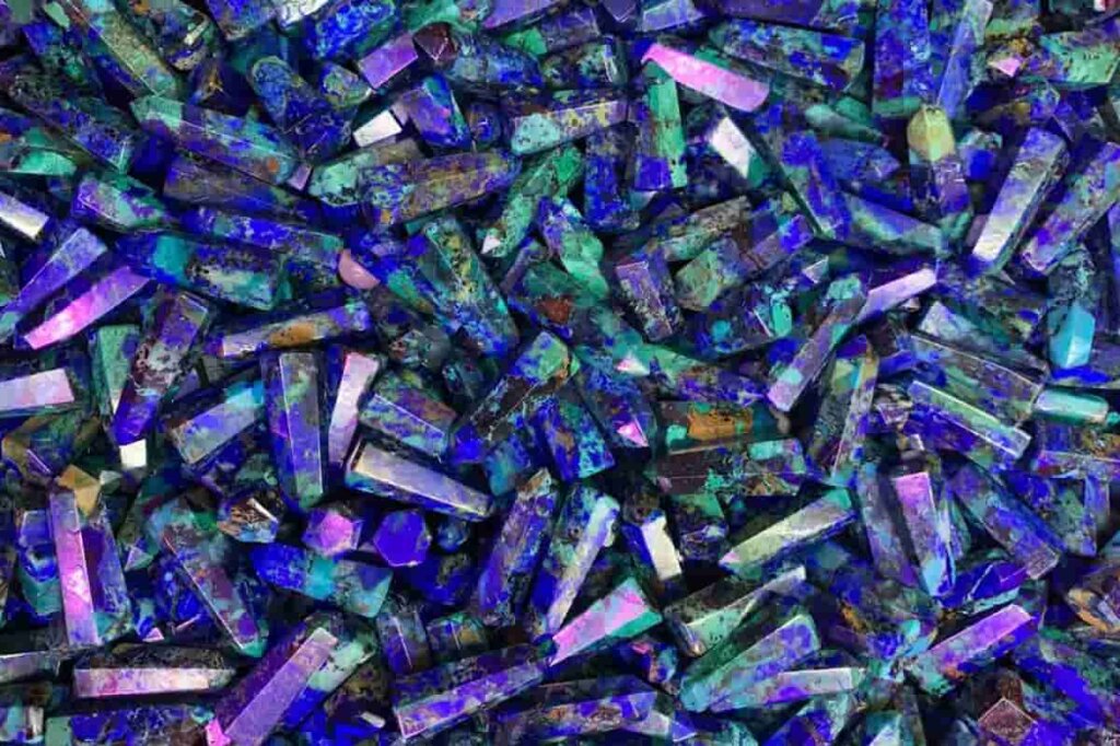 Azurite Malachite Meaning – Polished Azurite crystal towers in basket symbolizing transformation and intuition
