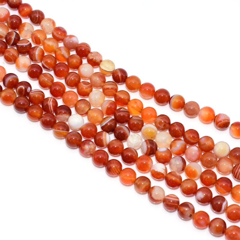 Top view of Carnelian Beads showing smooth surface and natural banding