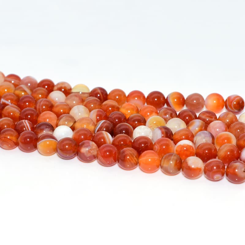Strand of 8mm Carnelian Beads aligned for jewelry making