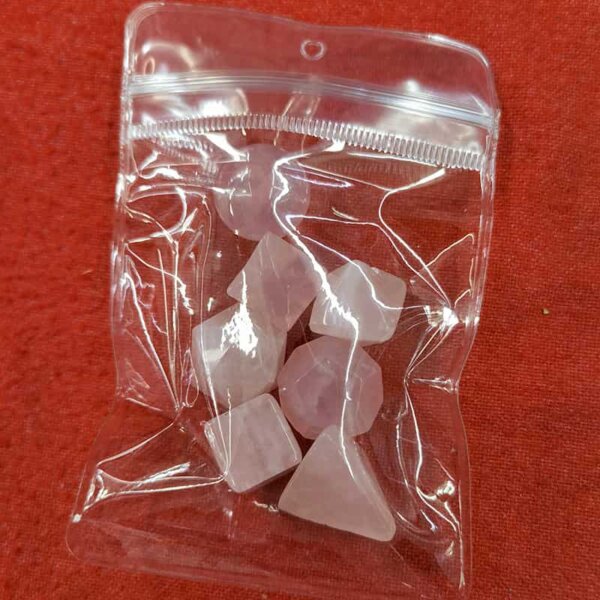Rose Quartz stone in Chakra Crystal Set promoting love and emotional harmony