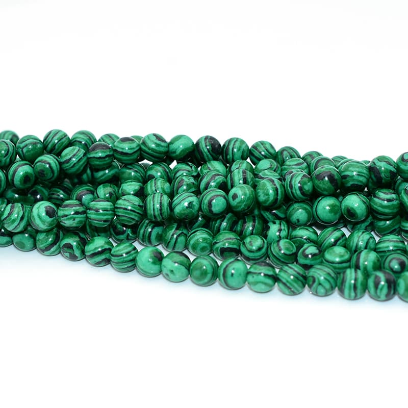 Detailed view of Fake Malachite Beads surface texture and striped pattern