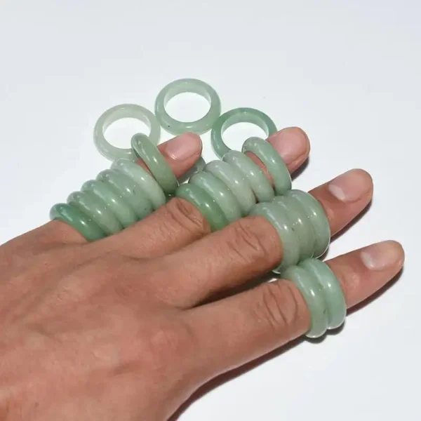 Green Aventurine Ring worn on fingers, showing its translucent green color and natural shine.