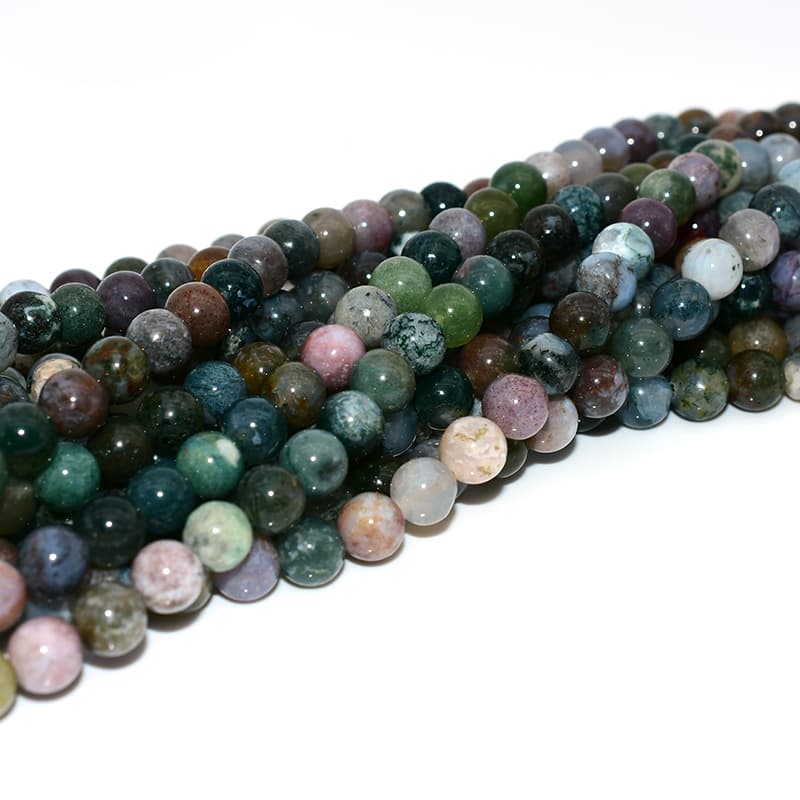 Close-up details of Indian Agate Beads showing natural color variation and smooth polish