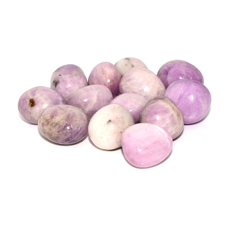 kunzite tumbled stone polished lilac crystals on white background