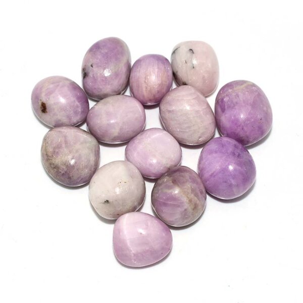 top view of kunzite tumbled stone group showing natural variation in tone