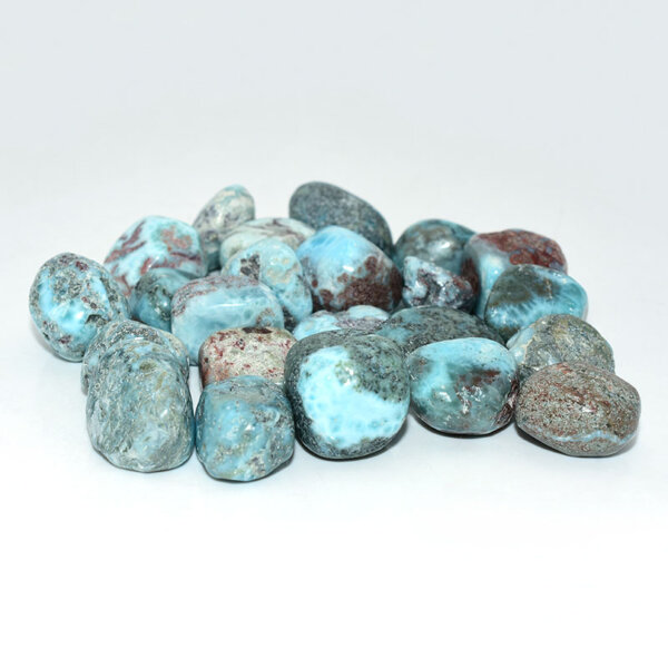 Larimar Tumbled Stone on white background, showing polished blue surface and natural patterns