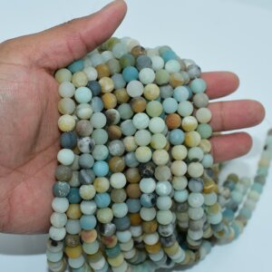 Matte Amazonite Beads held in hand showing size, texture, and calm color palette