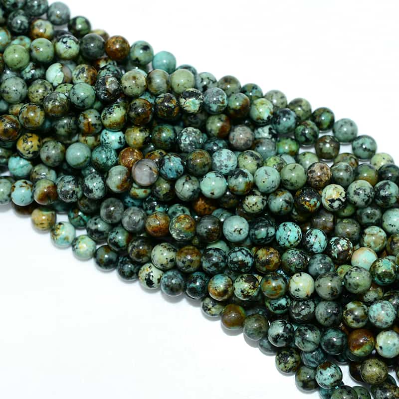 Top view of African Turquoise Beads strands showing consistent round shape and smooth polish