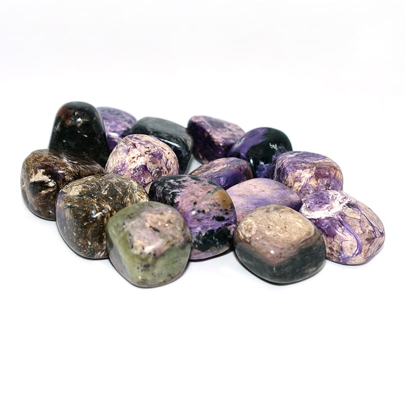 Charoite Tumble gemstones photographed from a different angle, highlighting unique violet swirls