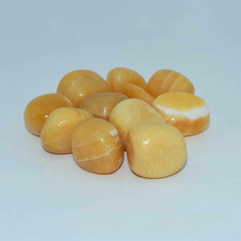 Orange Calcite Tumble stones 20–30mm polished crystals for wholesale