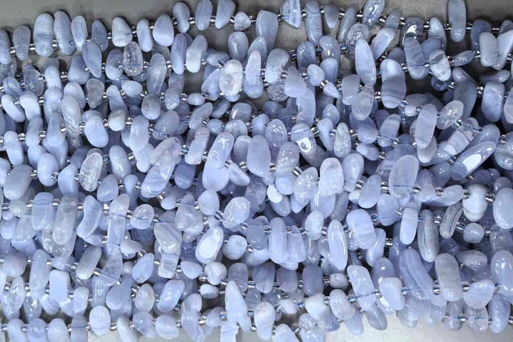 Blue Lace Agate beads showing Blue Lace Agate Meaning in jewelry designs