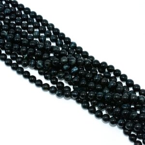 Blue Tiger Eye Beads top view showing hole alignment and bead uniformity on strand