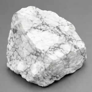 Natural howlite rough stone with white base and gray veining, raw howlite mineral showing classic howlite meaning